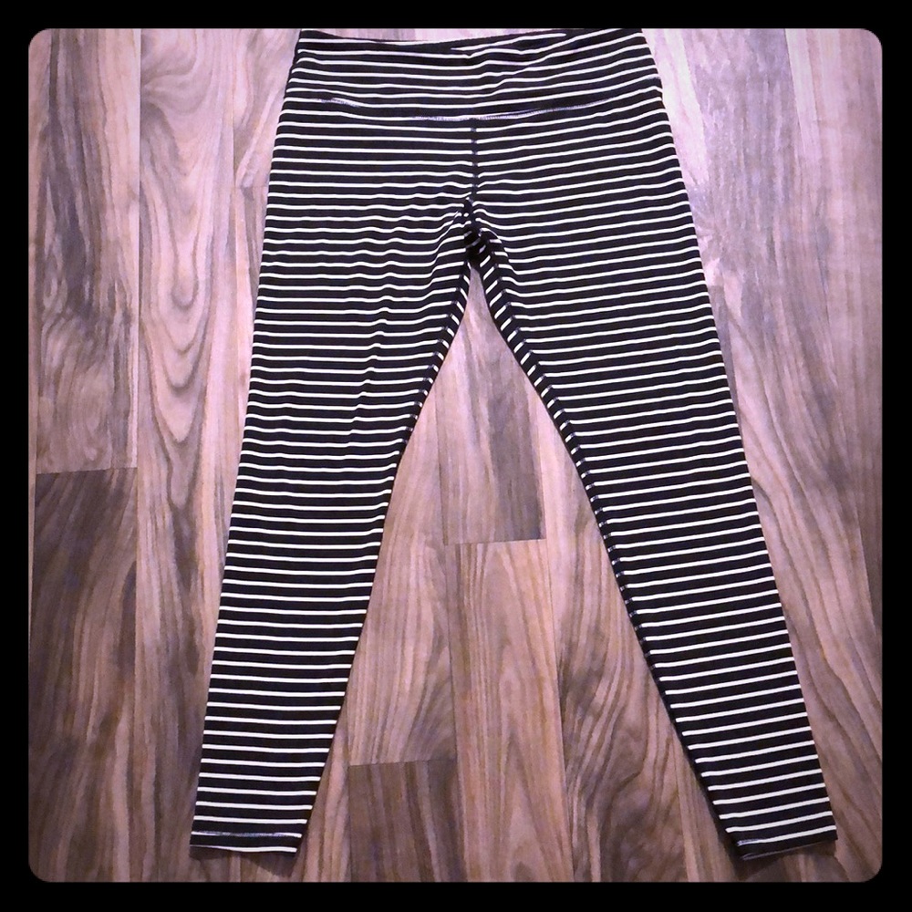 Scorpio Sol black & white strip workout pants